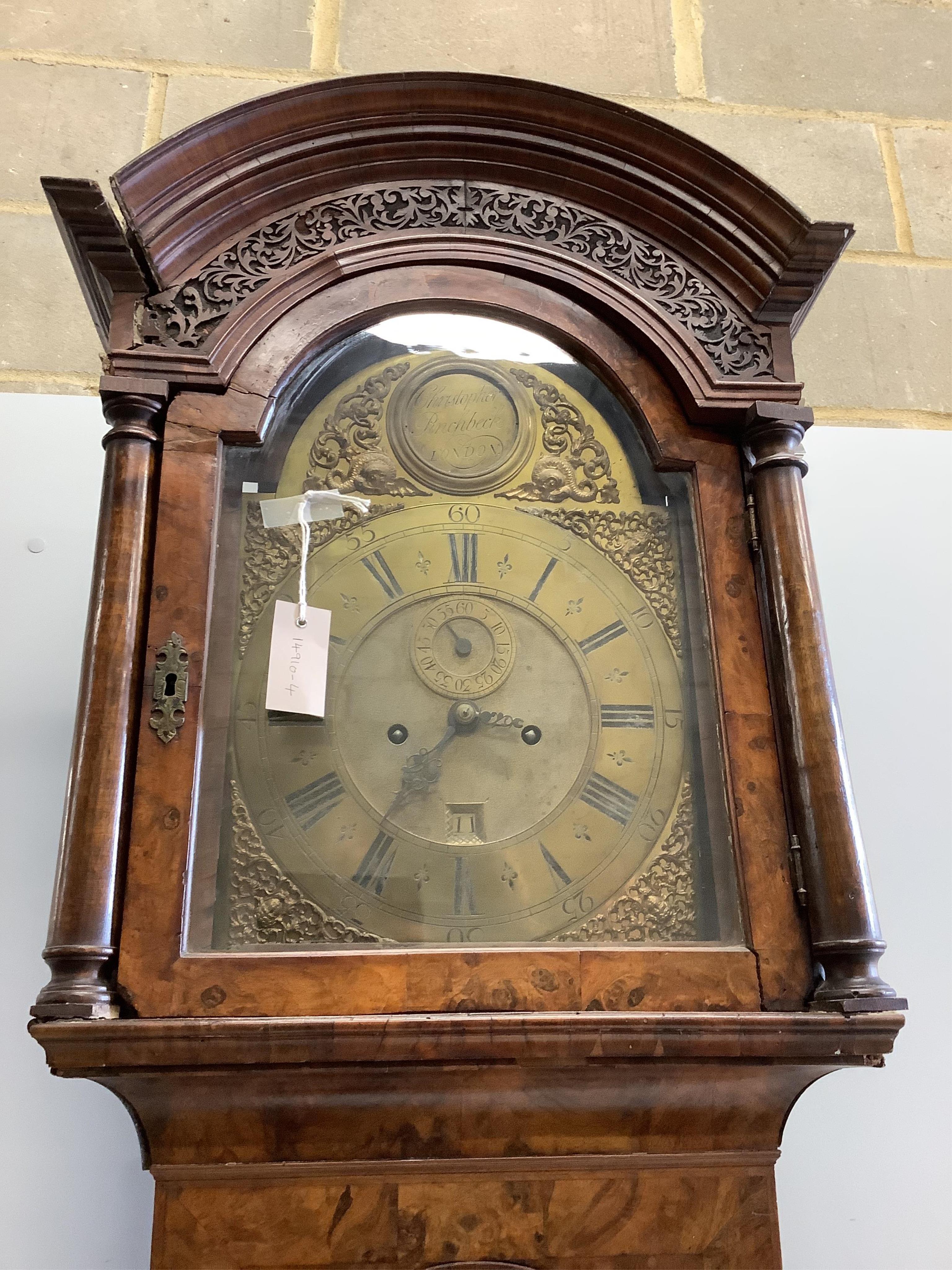 A George II walnut and feather banded longcase clock, Christopher Pinchbeck, London, height 237cm. Condition - poor